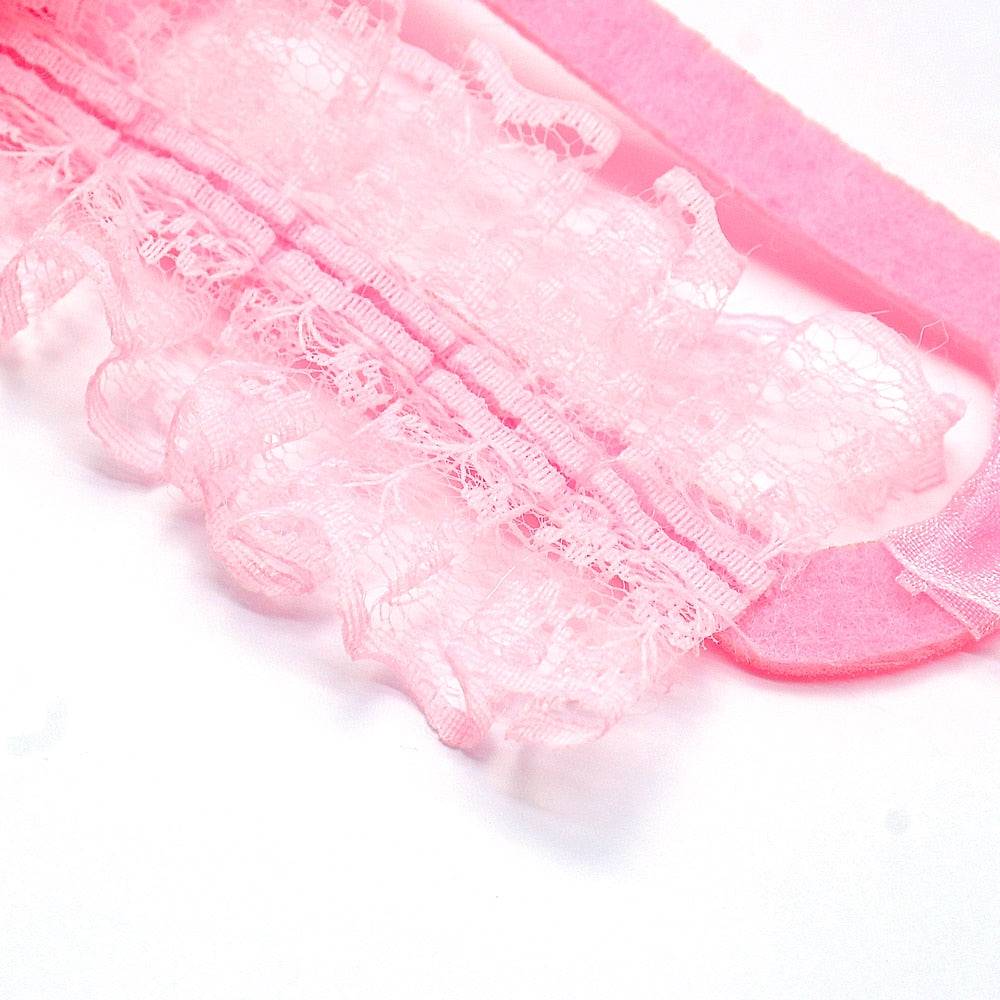 closeup pink frill lace dog hat material
