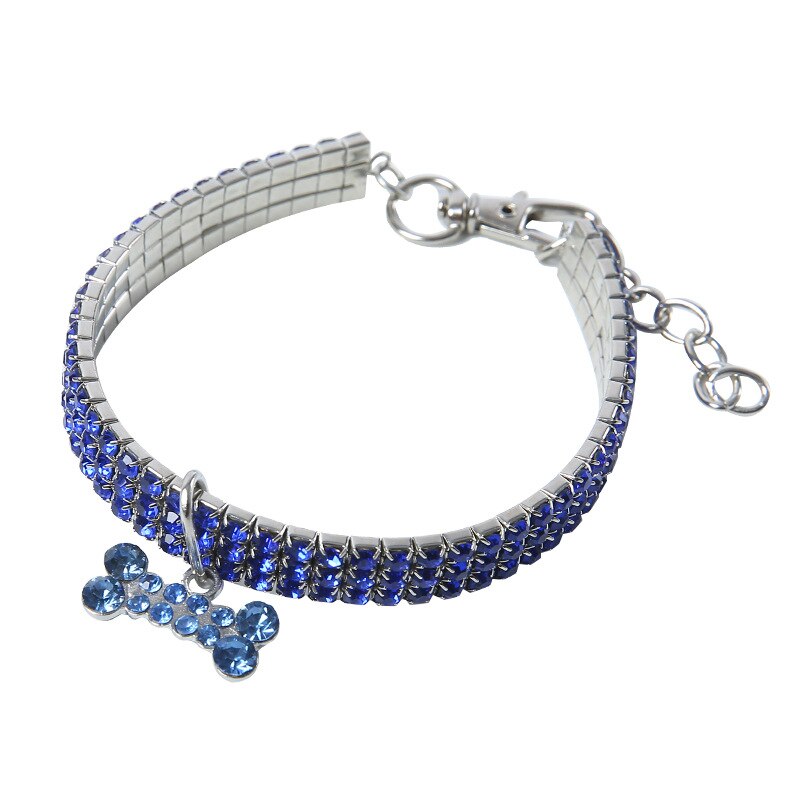 blue crystal dog collar with bone charm white background