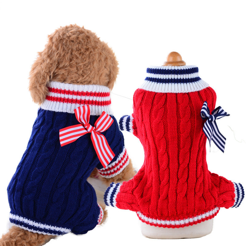 red blue sweater bow dog facing away