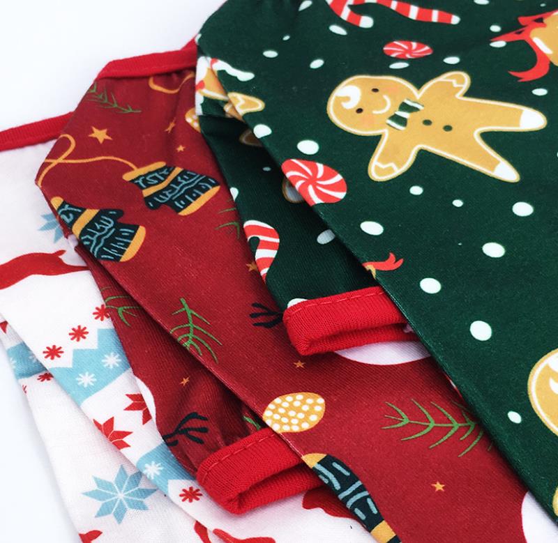 christmas onesie in red green and white with different prints