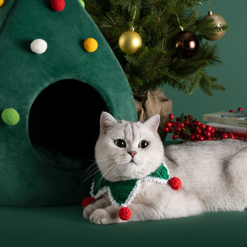 white cat bandanna tree bed christmas green