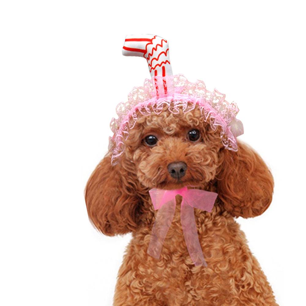 dog wearing pink milkshake straw hat