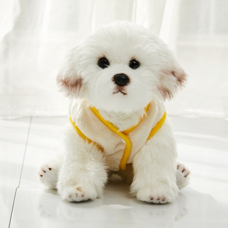 dog wearing yellow flannel shirt sitting