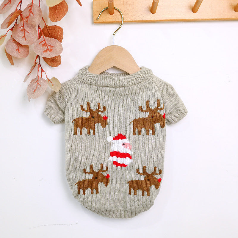 elk santa print grey sweater hanging white wall