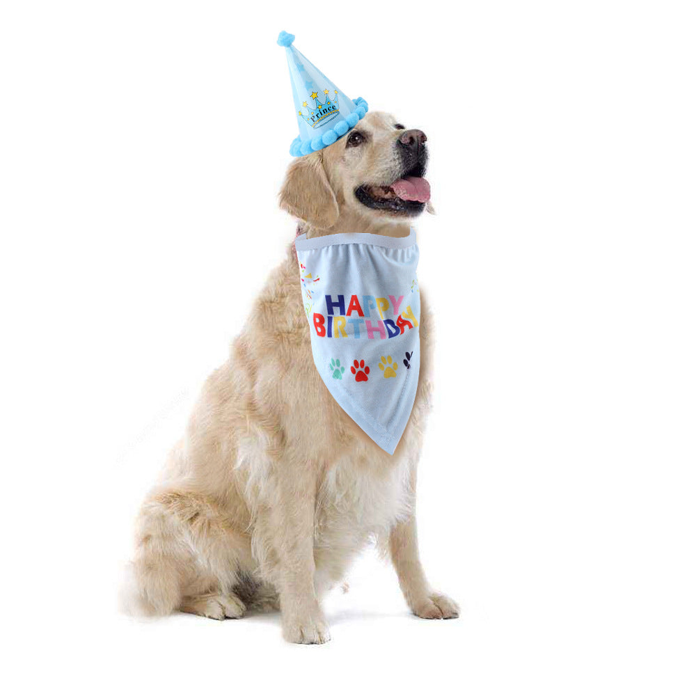 golden retriever sitting with tongue out wearing birthday bandanna and hat with white backround