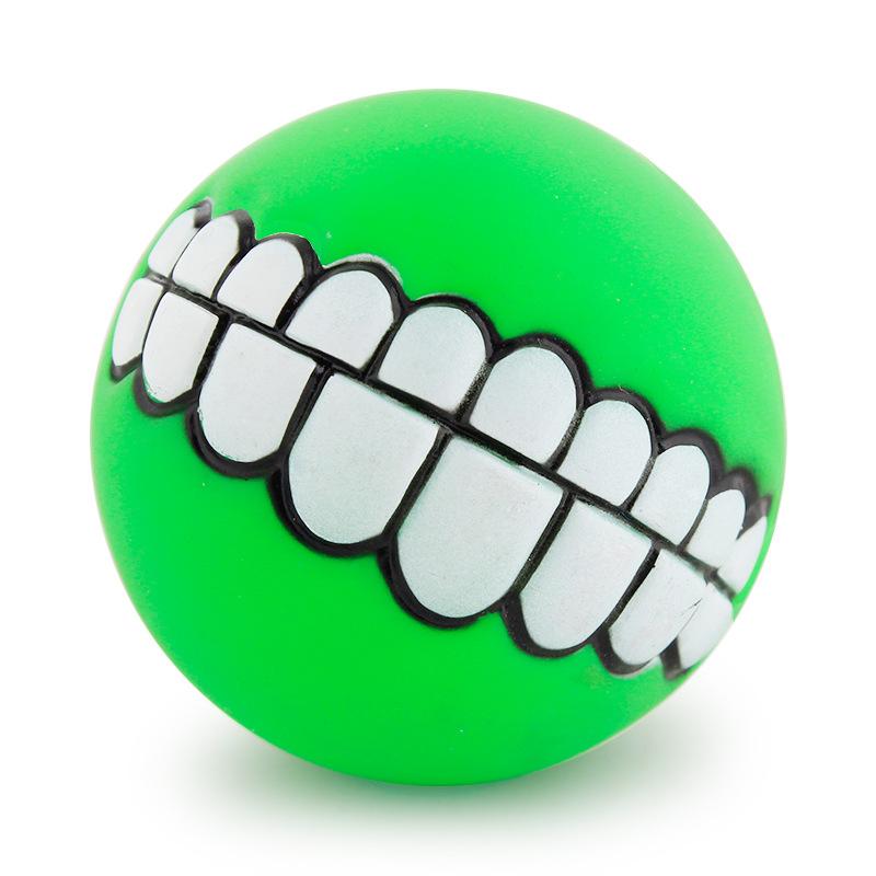 green teethed dog ball white background