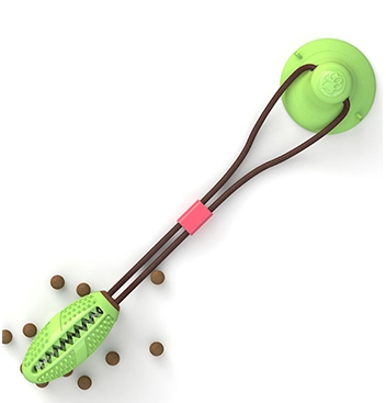 green stick dog toy suction cup treat dispenser