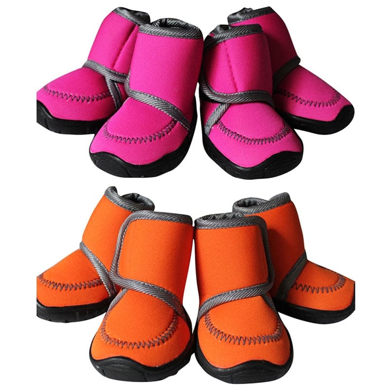 pink and orange smooth material dog shoes white background