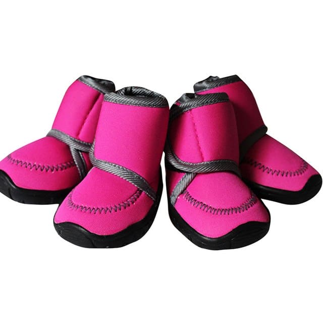 pink winter dog shoes smooth material white background