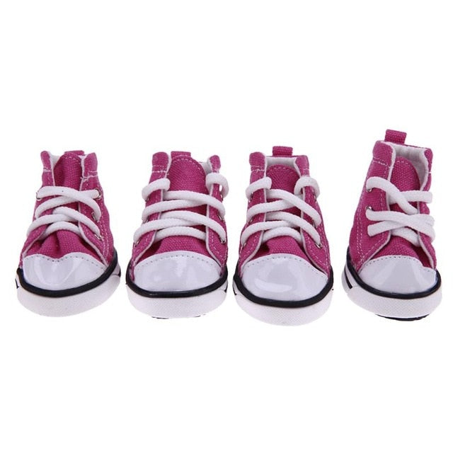 pink denim dog shoes white laces white background