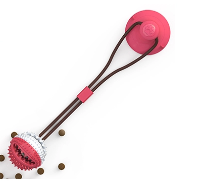 red ball dog toy stick treat holder