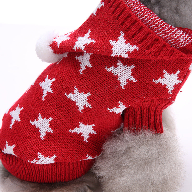 closeup red knitted dog sweater white stars