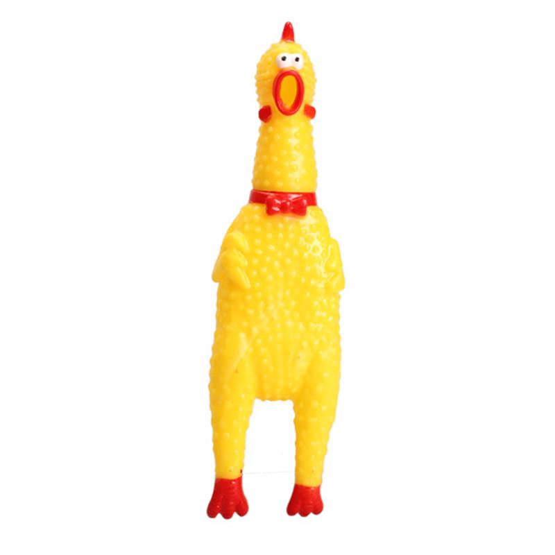 yellow and red chicken dog squeaky toy white background