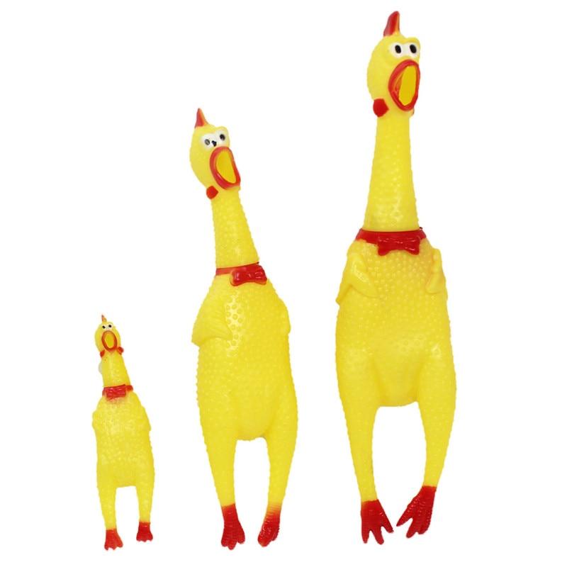 three rubber chicken dog toys various sizes white background