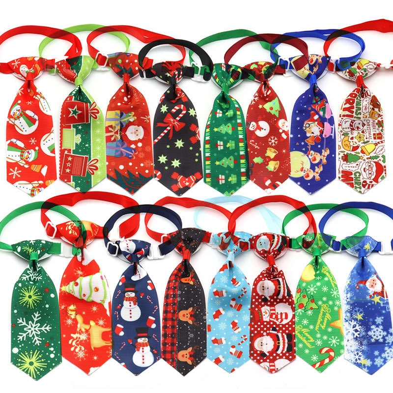 large variety of christmas pet neck ties on white background