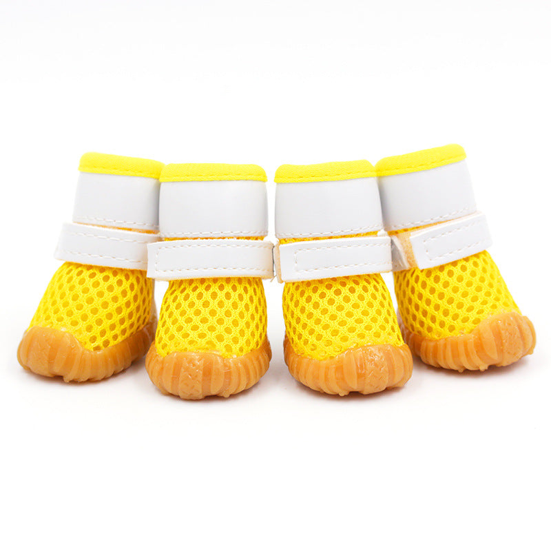 yellow dog mesh boot with white straps and white background